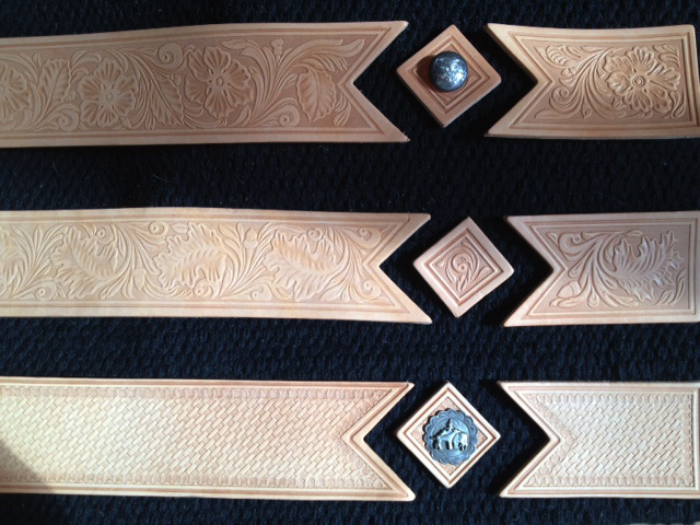 Tooled wear leathers for saddle blankets